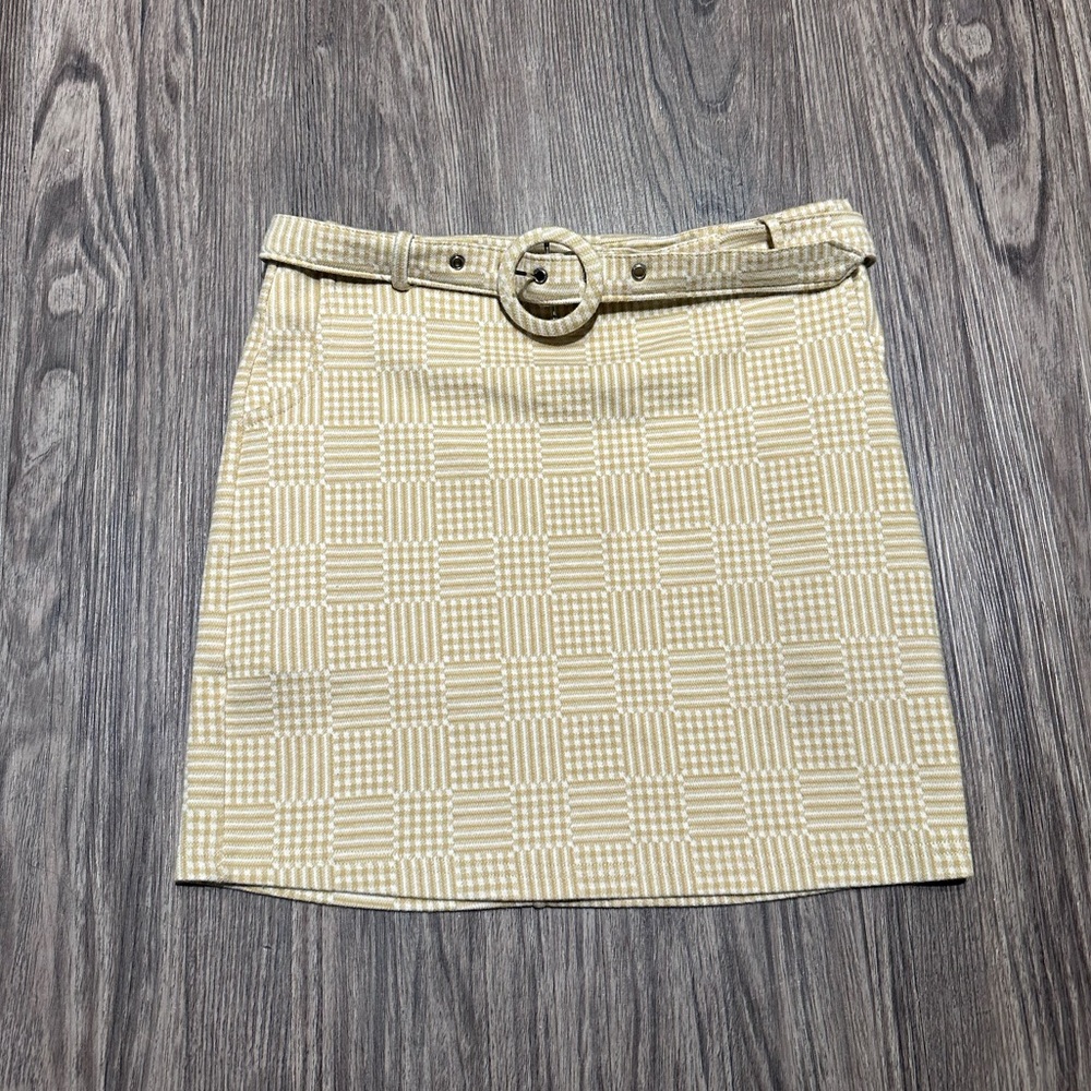 Plaid belted mini skirt in size S and it has pockets! Super cute & flattering.